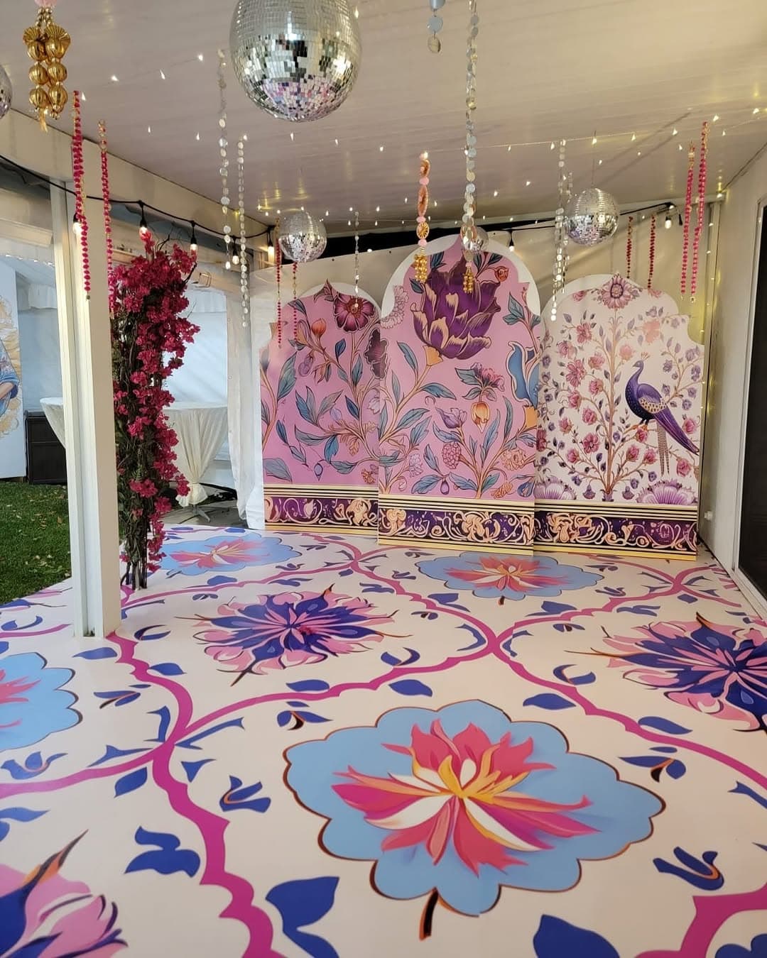 Custom vinyl floor wrap with elegant botanical design for luxury event